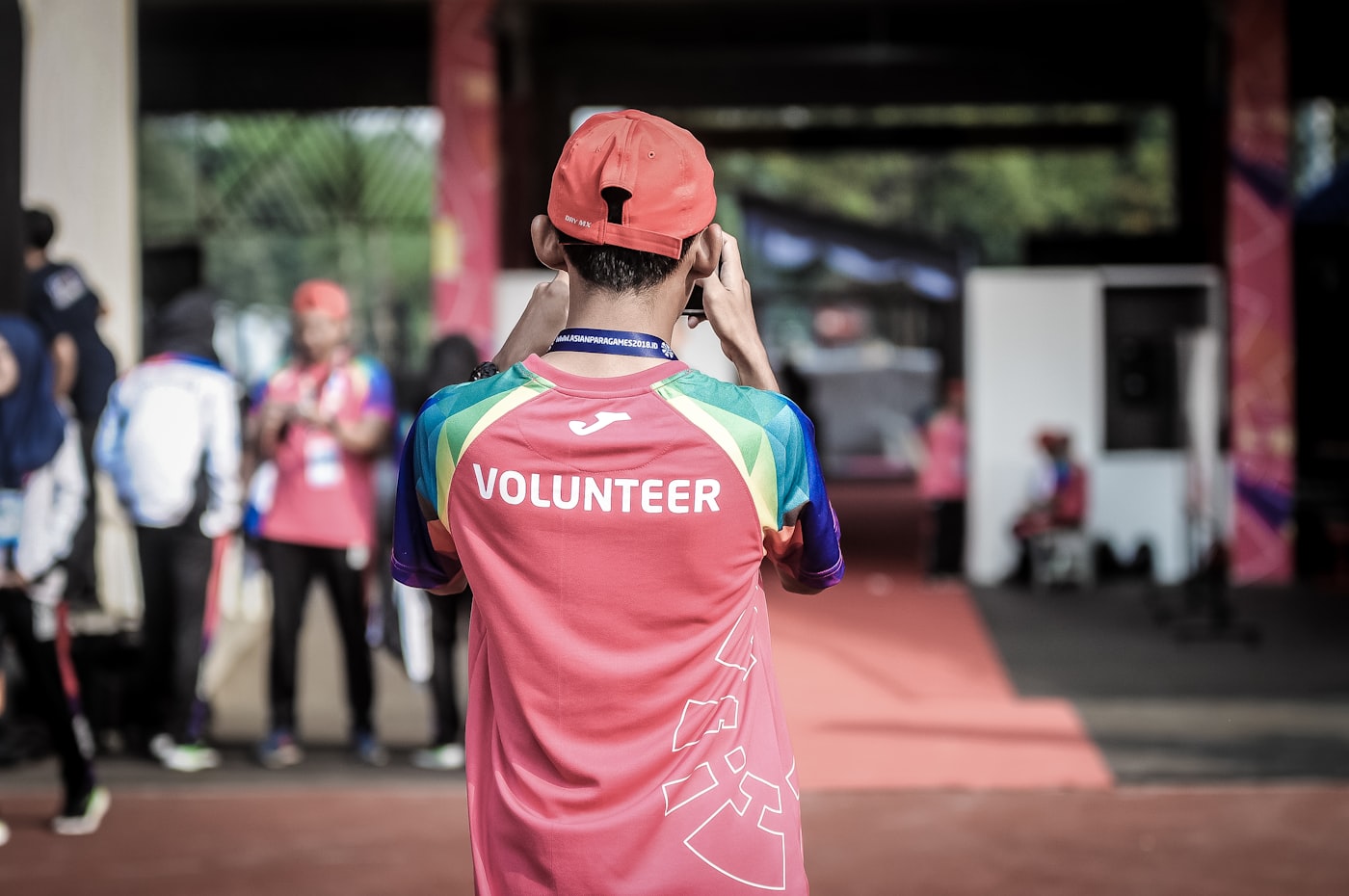 Volunteers joining hands in community service